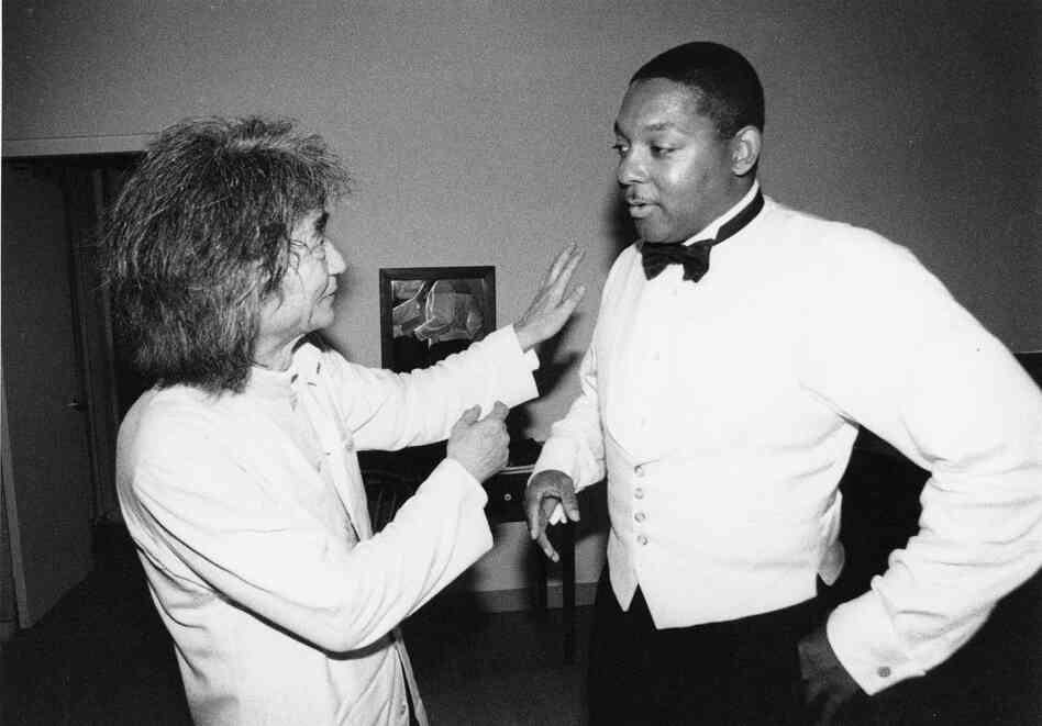 Undated: Seiji Ozawa confers with trumpeter Wynton Marsalis. 