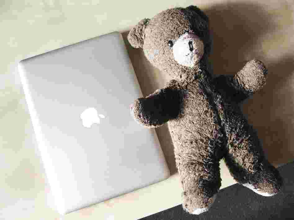 Michelle Ashton, 27, London, Web designer: "MacBook Pro. It's uninsured and full of work and personal photographs. Twenty-seven-year-old teddy bear, 'Teddy,' who has already survived one burning house."