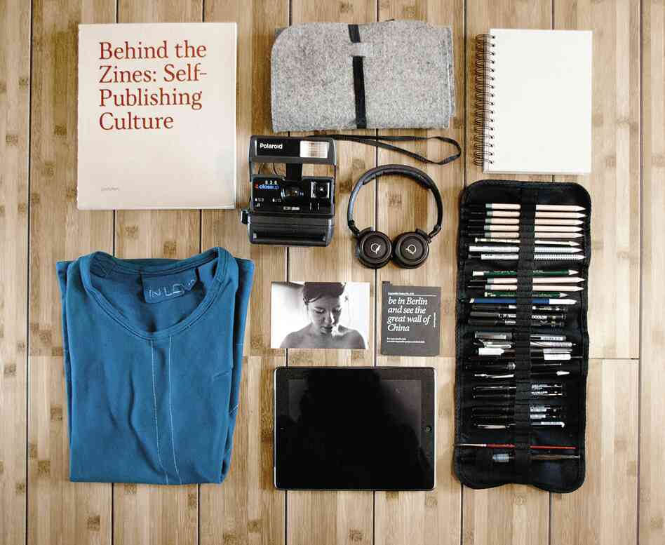 Manuel Platzer, 27, Austria, digital media: "... Headphones, Polaroid camera, photo of girlfriend ... drawing tools, iPad, T-shirt handmade by my girlfriend."