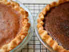 A Northeastern Bakewell Pie (left) and Western Chocolate Raisin Pie cool on author Adrienne Kane's Connecticut kitchen counter.
