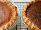 A Northeastern Bakewell Pie (left) and Western Chocolate Raisin Pie cool on author Adrienne Kane's Connecticut kitchen counter. A Northeastern Bakewell Pie (left) and Western Chocolate Raisin Pie cool on author Adrienne Kane's Connecticut kitchen counter.