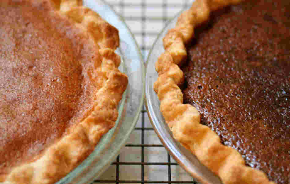 A Northeastern Bakewell Pie (left) and Western Chocolate Raisin Pie cool on author Adrienne Kane's Connecticut kitchen counter. A Northeastern Bakewell Pie (left) and Western Chocolate Raisin Pie cool on author Adrienne Kane's Connecticut kitchen counter.