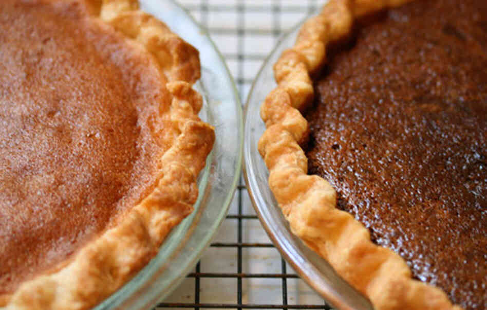 A Northeastern Bakewell Pie (left) and Western Chocolate Raisin Pie cool on author Adrienne Kane's Connecticut kitchen counter. A Northeastern Bakewell Pie (left) and Western Chocolate Raisin Pie cool on author Adrienne Kane's Connecticut kitchen counter.