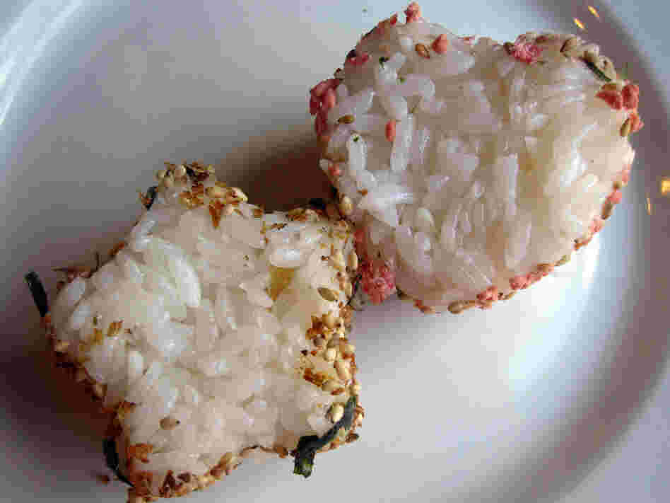Leftover rice can be pressed into shapes; the sides are rolled in furikake seasoning.