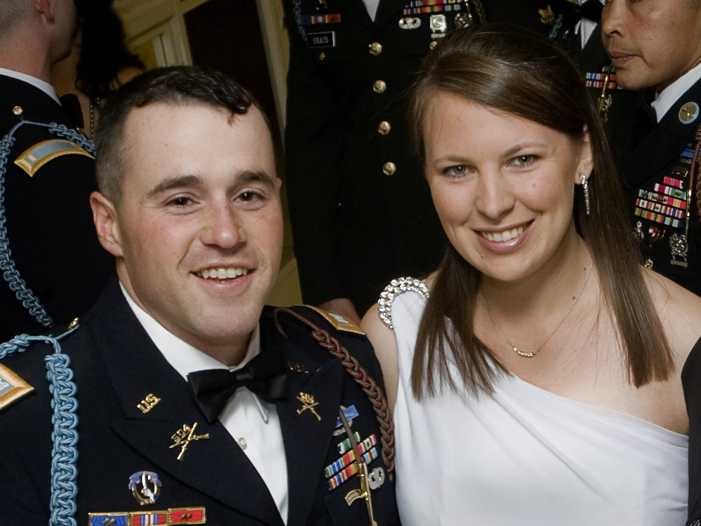 Capt. Jared Larpenteur and his wife, Clare, attend a military ball in Fayetteville, N.C., last December.