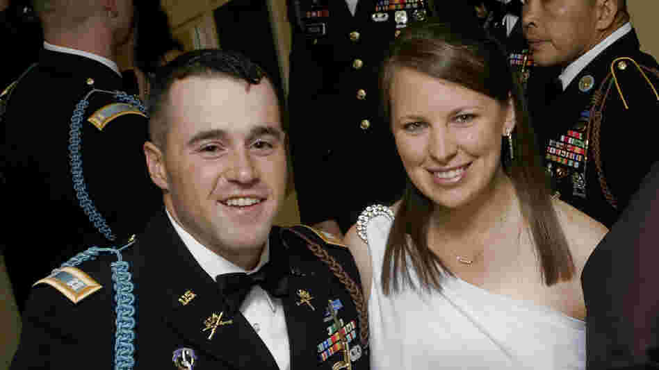 Capt. Jared Larpenteur and his wife, Clare, attend a military ball in Fayetteville, N.C., last December.