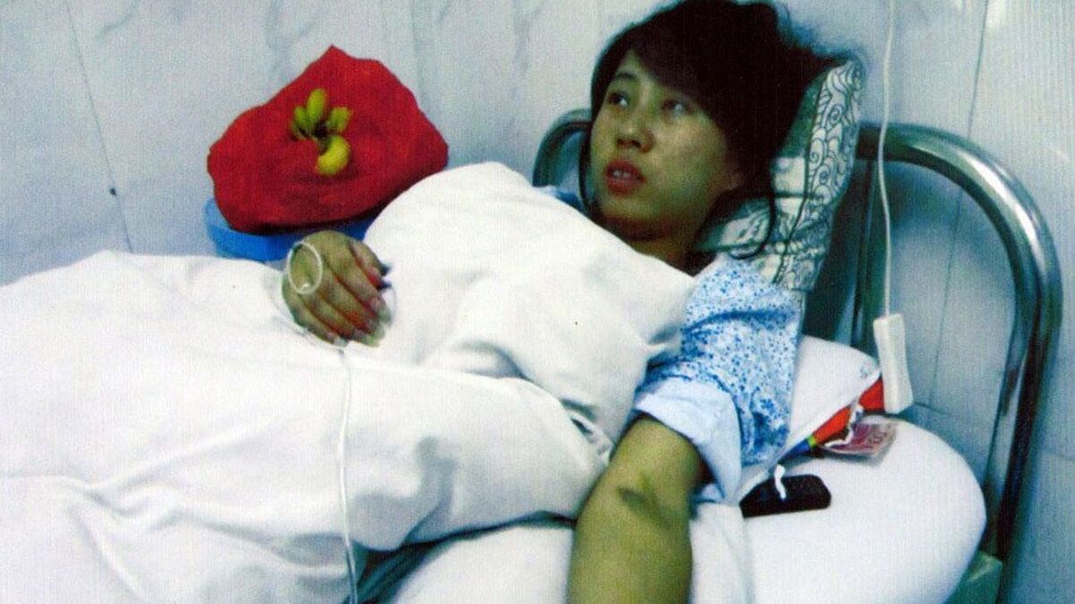 Feng Jianmei and her husband could not pay $6,000 in fines for violating China's one-child policy. In June, when she was seven months pregnant, local officials abducted her and forced her to have an abortion, her family says. The case has provoked widespread outrage.