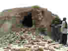 This image from a video shows Islamist militants destroying an ancient shrine in Timbuktu on Sunday.