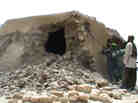 This image from a video shows Islamist militants destroying an ancient shrine in Timbuktu on Sunday.