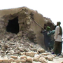 This image from a video shows Islamist militants destroying an ancient shrine in Timbuktu on Sunday.