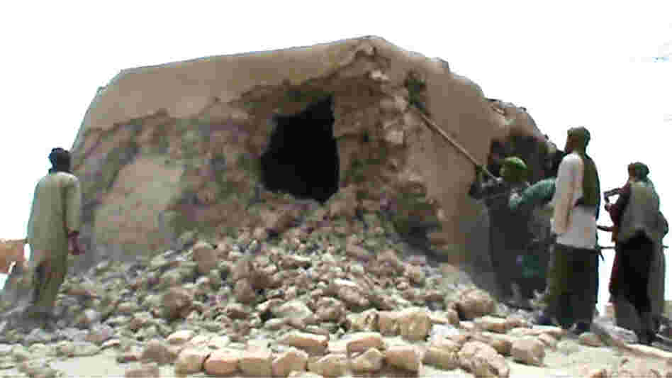 This image from a video shows Islamist militants destroying an ancient shrine in Timbuktu on Sunday.