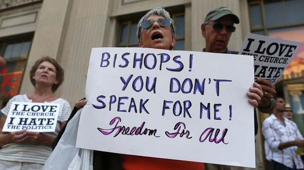 Protesters in Baltimore rally against the kickoff of Fortnight for Freedom, sponsored by the U.S. Conference of Catholic Bishops. The bishops say the campaign is a response to government attacks on religious liberty, but critics say it's an attack on the Obama administration.