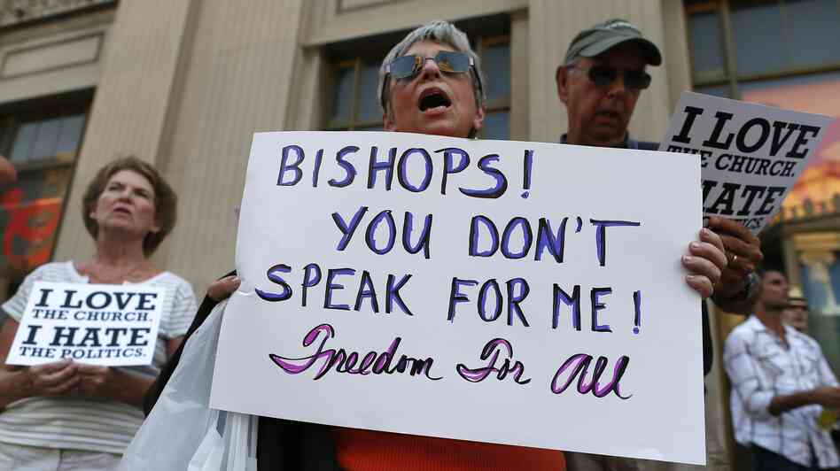 Protesters in Baltimore rally against the kickoff of Fortnight for Freedom, sponsored by the U.S. Conference of Catholic Bishops. The bishops say the campaign is a response to government attacks on religious liberty, but critics say it's an attack on the Obama administration.