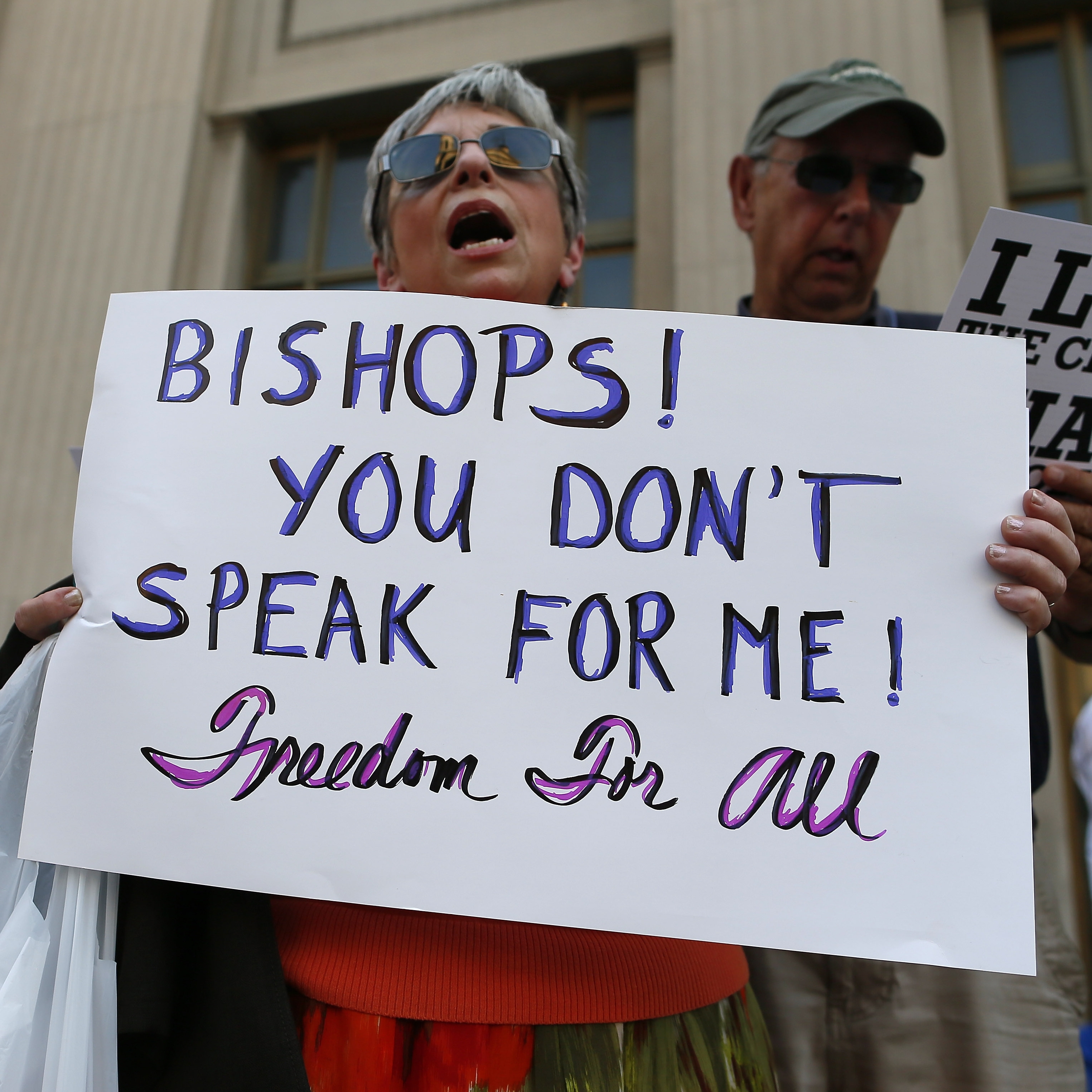 Protesters in Baltimore rally against the kick off to "Fortnight for Freedom," sponsored by the U.S. Conference of Catholic Bishops. The bishops say the effort is a response to government attacks on religious liberty, but critics say the campaign is an attack on the Obama administration.