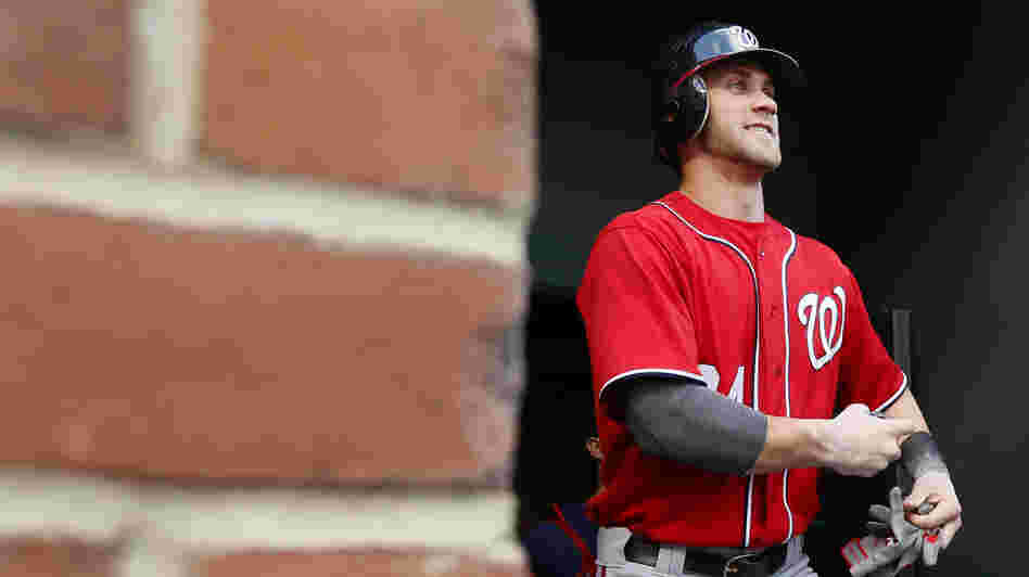 Washington Nationals' Bryce Harper walks out of the clubhouse before an interleague baseball game in Baltimore.