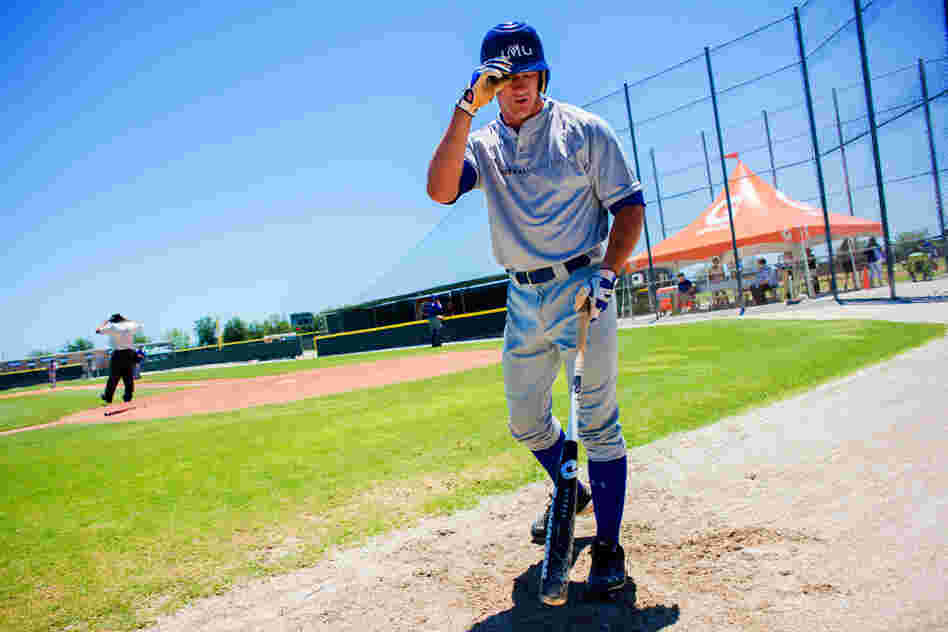Ketchum Marsh, a high school senior from Massachusetts, walks back to the dugout during a May 21 intrasquad game at IMG Baseball Academy in Bradenton, Fla., where he trains and goes to school.