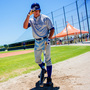 Ketchum Marsh, a senior from Massachusetts, walks back to the dugout during an intrasquad game at IMG Baseball Academy, where he trains and goes to school.