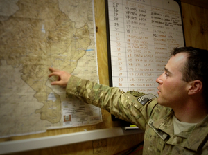 Capt. Jared Larpenteur plans a combat mission at the 82nd Airborne's Delta Company command center in Ghazni province, Afghanistan, earlier this year. Capt. Jared Larpenteur plans a combat mission at the 82nd Airborne's Delta Company command center in Ghazni province, Afghanistan, earlier this year.