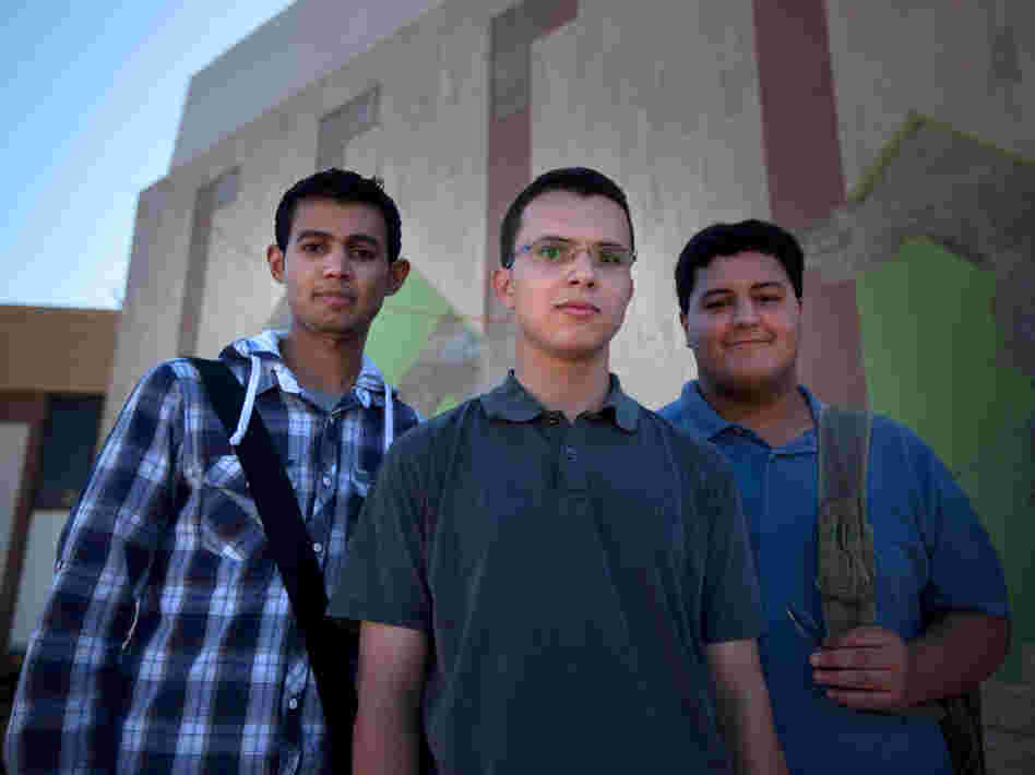 Three students outside the Science College of Benghazi University. They say they expect to have opportunities in Libya that would not have been possible when Moammar Gadhafi was in power.