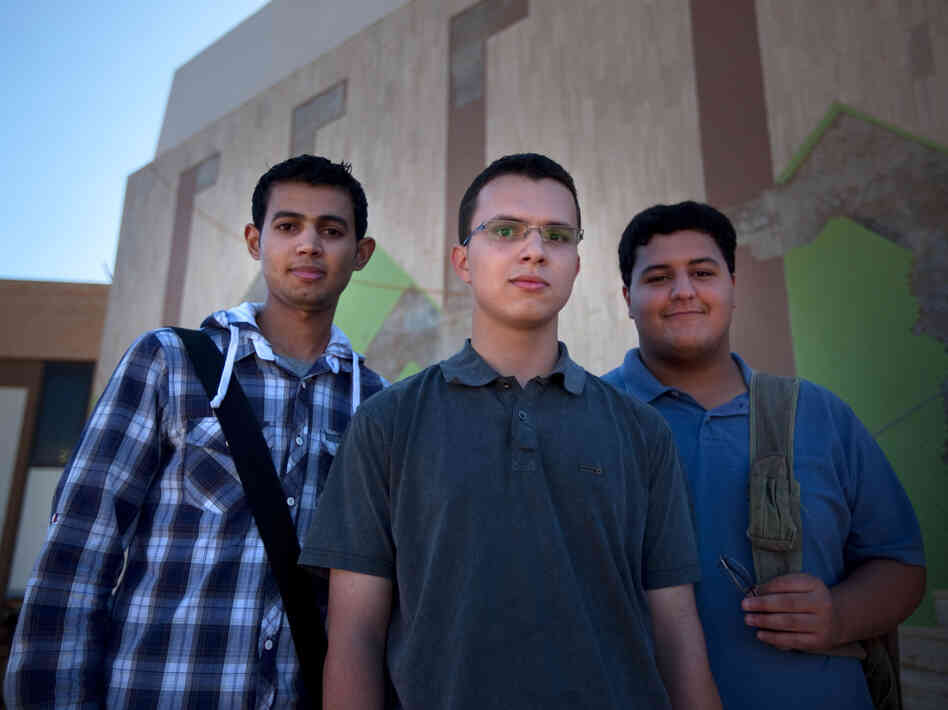 Three students outside the Science College of Benghazi University. They say they expect to have opportunities in Libya that would not have been possible when Moammar Gadhafi was in power.