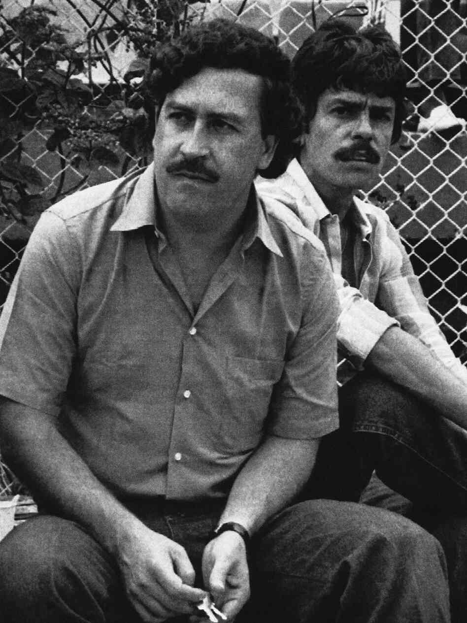 Escobar, the Medellin drug cartel boss, watches a soccer game in Medellin, Colombia, in 1983. He was gunned down in 1993 after a long manhunt and more than a decade of ruling Colombia through terror.