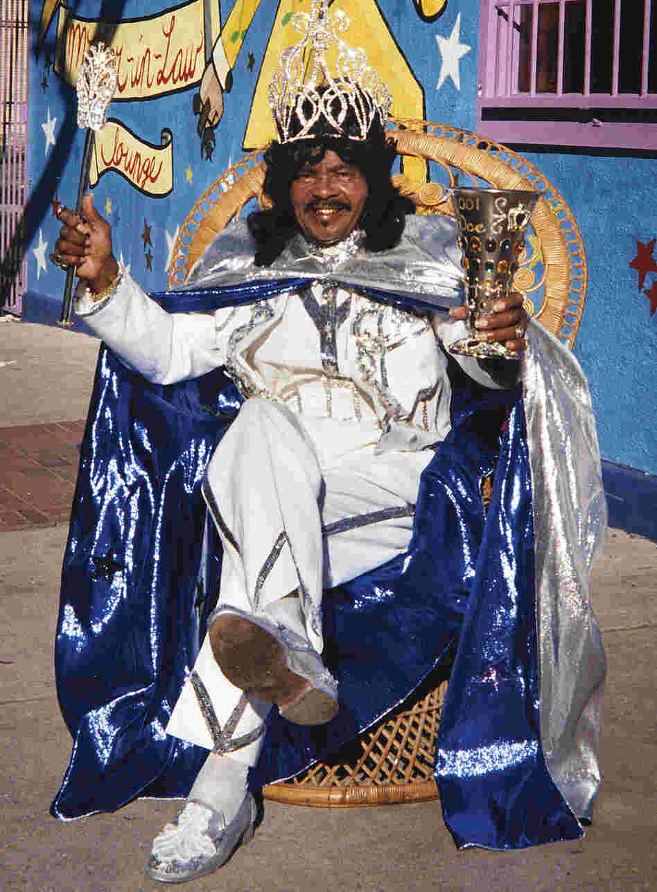 Ernie K-Doe poses outside his Mother-In-Law Lounge during Jazz Fest in New Orleans in 2001. He died a few months later and was buried in St. Louis Cemetery No. 2.