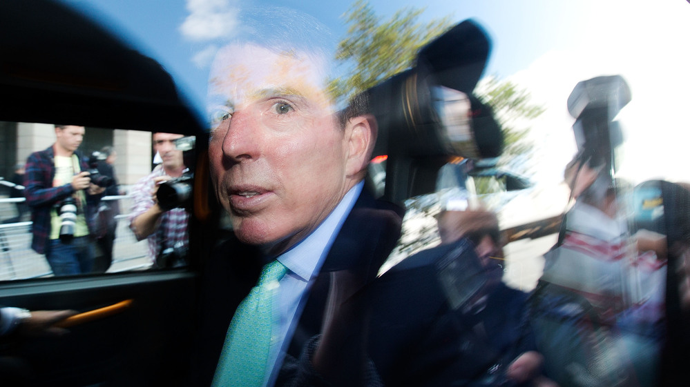 Former Barclays CEO Bob Diamond leaves Parliament amid a crowd of reporters in London on Wednesday. Diamond, who resigned  Tuesday, was questioned about a growing interest-rate manipulation scandal.