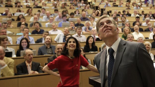 Fabiola Gianotti of the ATLAS group (left) and Joe Incandela of the Compact Muon Spectrometer team announced their findings during a presentation Wednesday in Switzerland.