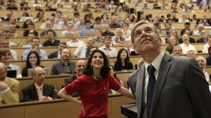 Fabiola Gianotti of the ATLAS group (left) and Joe Incandela of the Compact Muon Spectrometer team announced their findings during a presentation Wednesday in Switzerland.