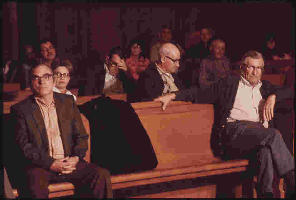 Men wait for the Beckley Black Lung Association meeting to begin. A fight for safer regulations dramatically decreased the hazards of mining.