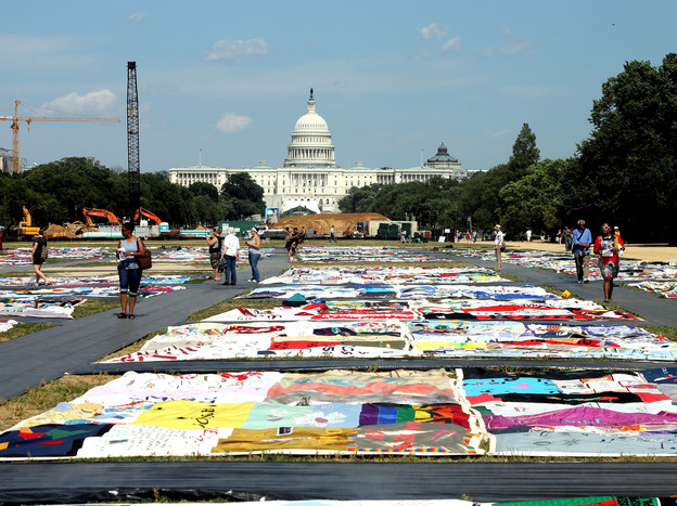 Visitors view the AIDS Memorial Quilt at the National Mall.
