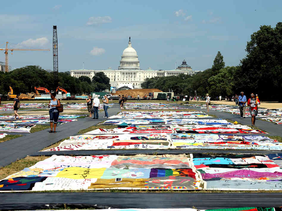 Visitors view the AIDS Memorial Quilt at the National Mall.