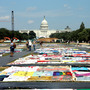 Visitors view the AIDS Memorial Quilt at the National Mall.