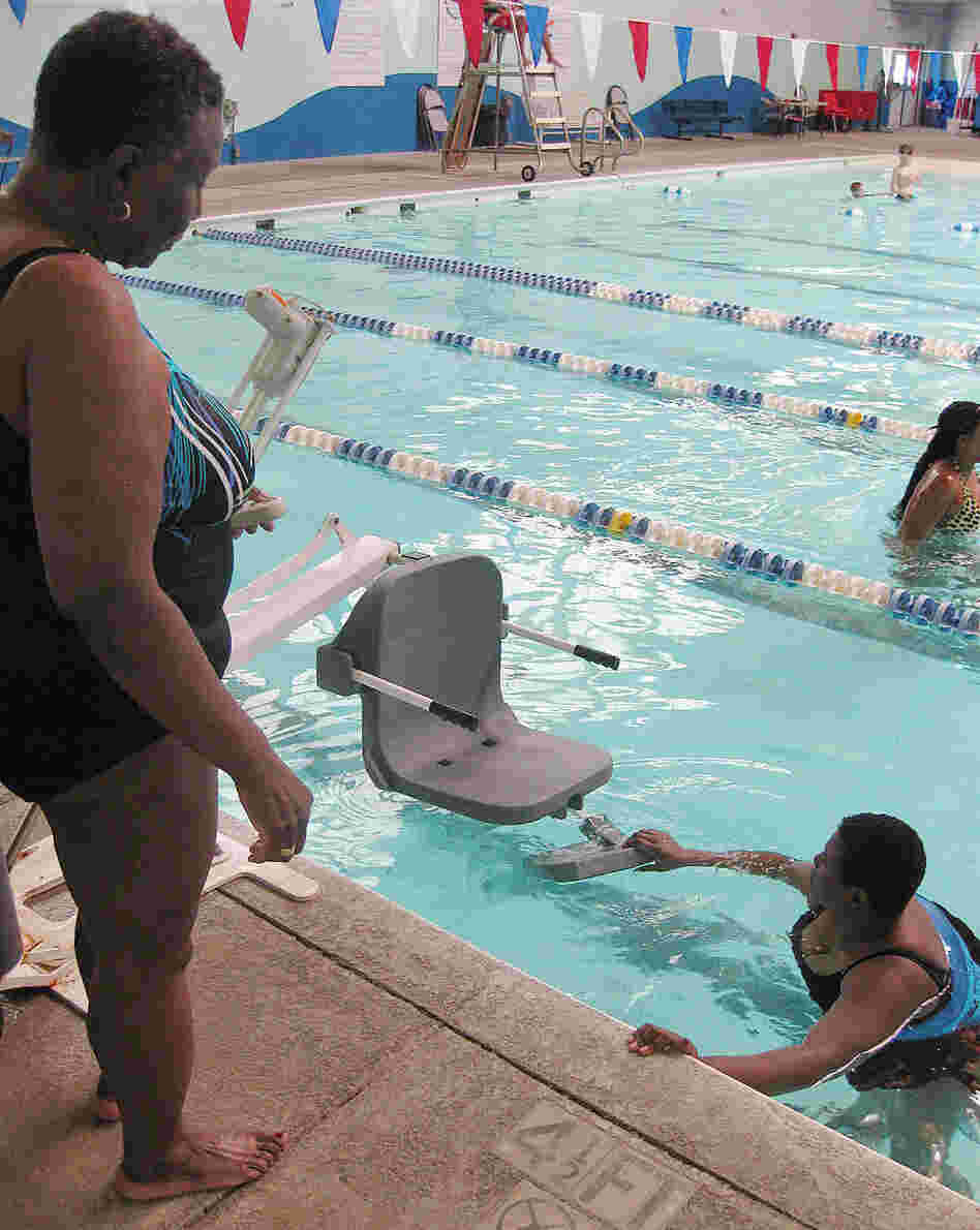 New government regulations require public pools to have chair lifts, like this one in Savannah, Ga., for people with disabilities. The compliance deadline has been extended for a second time.