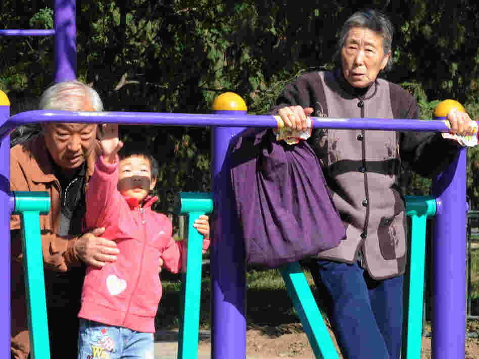 Young and old exercise at the Temple of Heaven park in Beijing in October. Experts say China's health care costs will be difficult to fund due to the population imbalance.