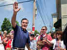 Republican presidential candidate Mitt Romney participates during the Wolfeboro, N.H., Independence Day parade on Wednesday.