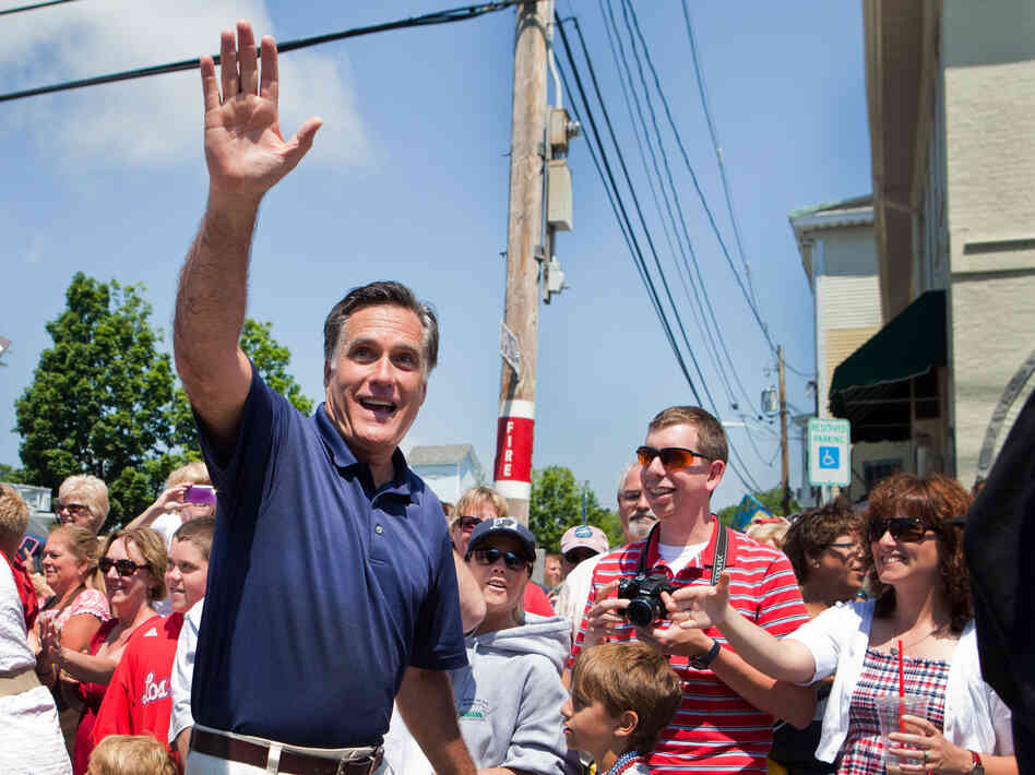 Republican presidential candidate Mitt Romney participates during the Wolfeboro, N.H., Independence Day parade on Wednesday.