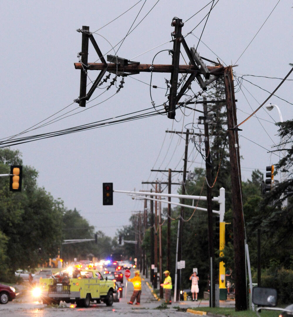 A power pole is bent after severe storms hit the Bemidji, Minn., area on Tuesday, knocking down thousands of trees and causing extensive damage to utility lines. Thousands of customers were left without power.