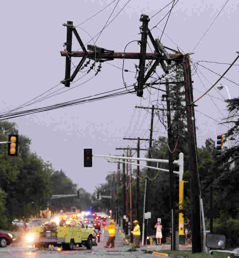 A power pole is bent after severe storms hit the Bemidji, Minn., area on Tuesday, knocking down thousands of trees and causing extensive damage to utility lines. Thousands of customers were left without power.