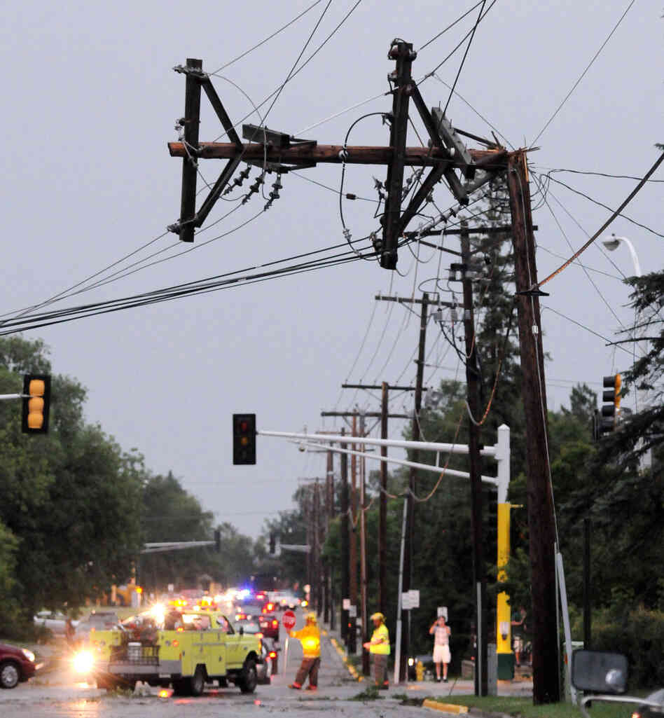 A power pole is bent after severe storms hit the Bemidji, Minn., area on Tuesday, knocking down thousands of trees and causing extensive damage to utility lines. Thousands of customers were left without power.