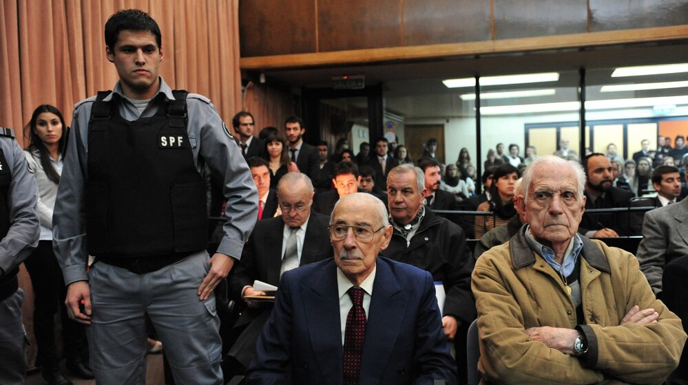 Former Argentinean dictators Jorge Rafael Videla, center, and Reynaldo Bignone, right, were convicted for their roles in stealing babies from political prisoners during the country's military dictatorship in the 1970s and 1980s.