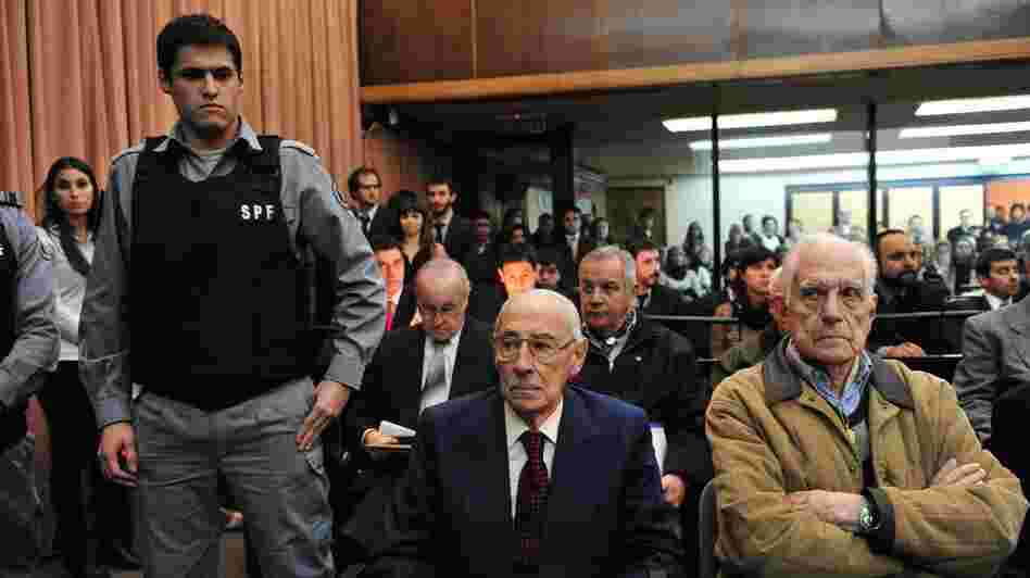 Former Argentinean dictators Jorge Rafael Videla, center, and Reynaldo Bignone, right, were convicted for their roles in stealing babies from political prisoners during the country's military dictatorship in the 1970s and 1980s.