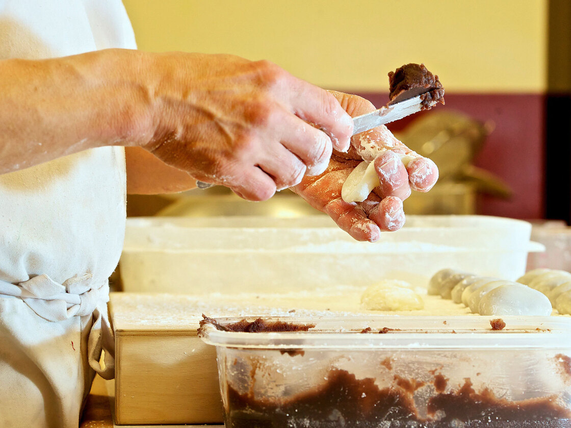 Manju-maker Art Oki uses two types of fillings, or anko: one made from lima beans and a darker one made from red azuki beans.