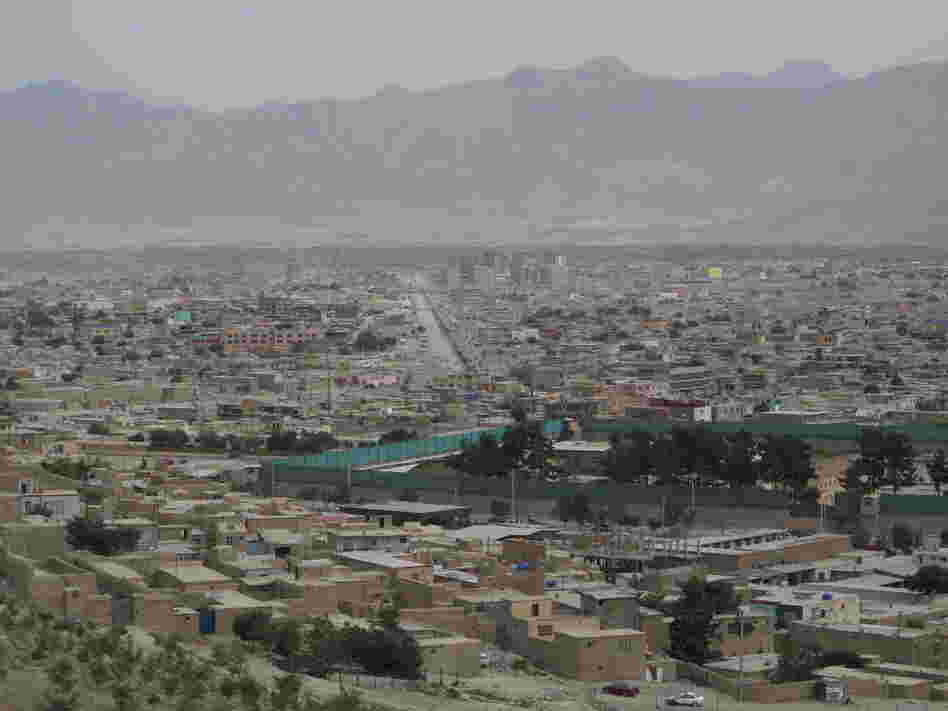 Kabul continues to sprawl in all directions, and a brown haze often hangs over the dusty city.