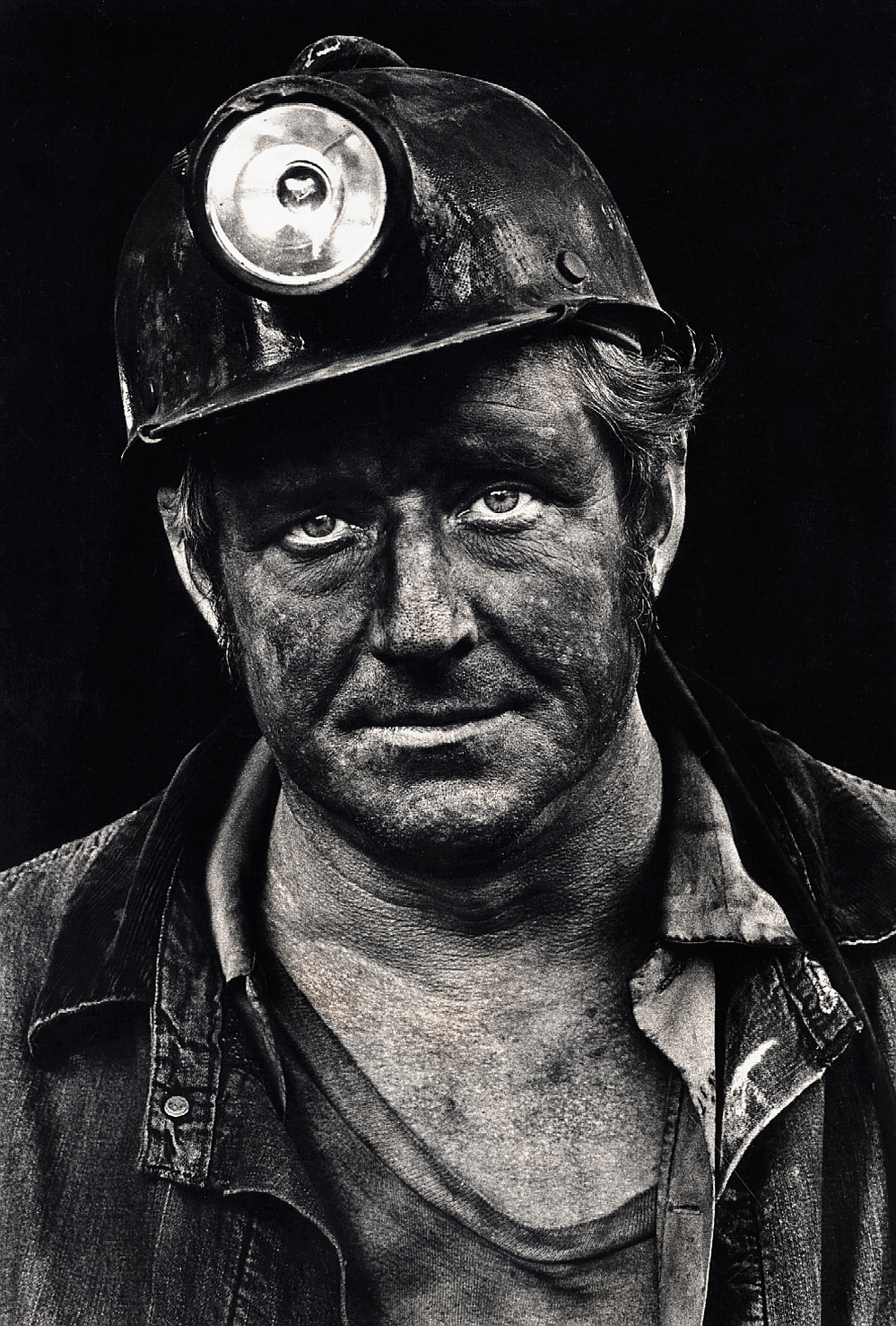 Coal miner Lee Hipshire in 1976, shortly after emerging from a mine in Logan County, W.Va. at the end of his shift. At age 36, he had worked 26 years underground. A few years later, Lee took early retirement because of pneumoconiosis, or black lung disease. He died at 57.