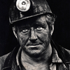 Coal miner Lee Hipshire in 1976, shortly after emerging from a mine in Logan County, W.Va. at the end of his shift. At age 36, he had worked 26 years underground. A few years later, Lee took early retirement because of pneumoconiosis, or black lung disease. He died at 57.
