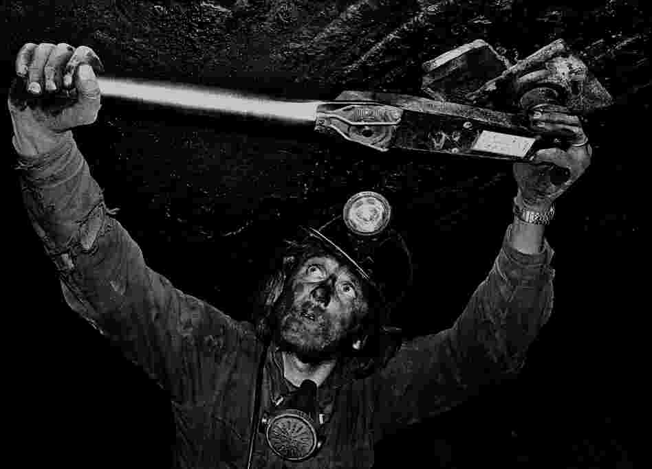 Buck Koptchak tests the torque on a coal mine roof expansion bolt in Clearfield County, Pa. Two years earlier, his father was killed doing the same job.