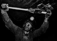 Buck Koptchak tests the torque on a coal mine roof expansion bolt in Clearfield County, Pa. Two years earlier, his father was killed doing the same job.