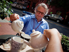 Joe Palca serves up some hot tea on a very hot day at Teaism in Washington, D.C., last week. Joe Palca serves up some hot tea on a very hot day at Teaism in Washington, D.C., last week.