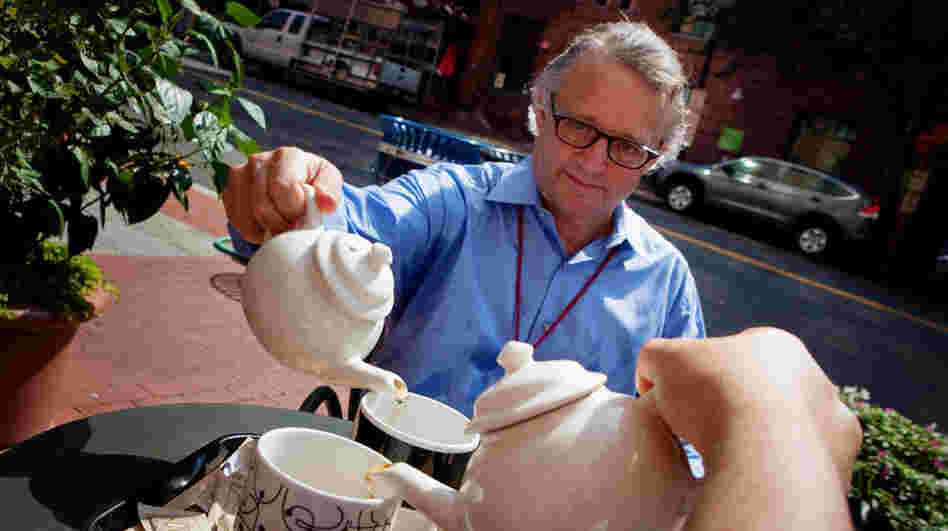 Joe Palca serves up some hot tea on a very hot day at Teaism in Washington, D.C., last week.